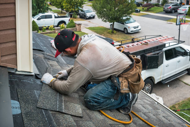Professional Emergency Roof Repair technician working in Holliston, MA